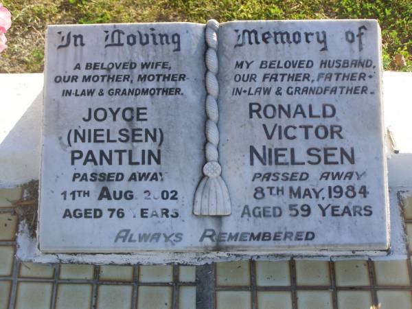 Joyce (Nielsen) PANTLIN,  | wife mother mother-in-law grandmother,  | died 11 Aug 2002 aged 76 years;  | Ronald Victor NIELSEN,  | husband father father-in-law grandfather,  | died 8 May 1984 aged 59 years;  | Polson Cemetery, Hervey Bay  | 