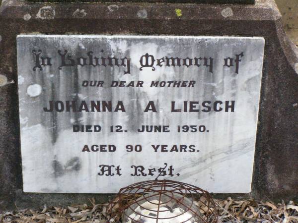 Ferdinand L. LIESCH, husband father,  | died 19 Jan 1942 aged 83 years 10 months;  | Johanna A. LIESCH, mother,  | died 12 June 1950 aged 90 years;  | Ropeley Immanuel Lutheran cemetery, Gatton Shire  | 