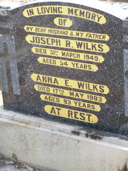 Joseph R. WILKS, husband father,  | died 31 March 1949 aged 54 years;  | Anna E. WILKS,  | died 17 May 1983 aged 83 years;  | Ropeley Immanuel Lutheran cemetery, Gatton Shire  | 