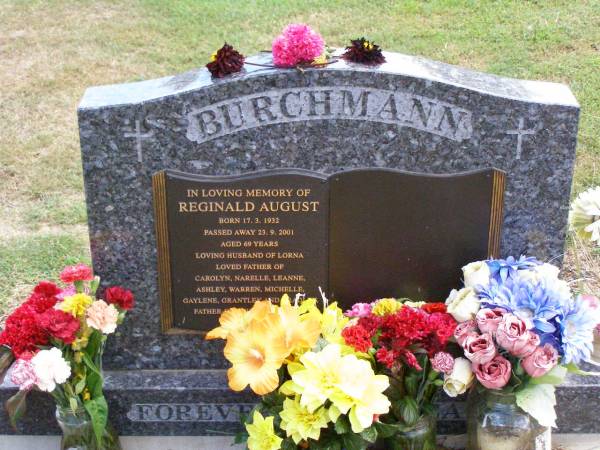 Reginald August BURCHMANN,  | born 17-3-1932 died 23-9-2201 aged 69 years,  | husband of Lorna,  | father of Carolyn, Narelle, Leanne, Ashley,  | Warren, Michelle, Gaylene, Grantley & Bradley,  | father-in-law grandpa  | Ropeley Immanuel Lutheran cemetery, Gatton Shire  | 