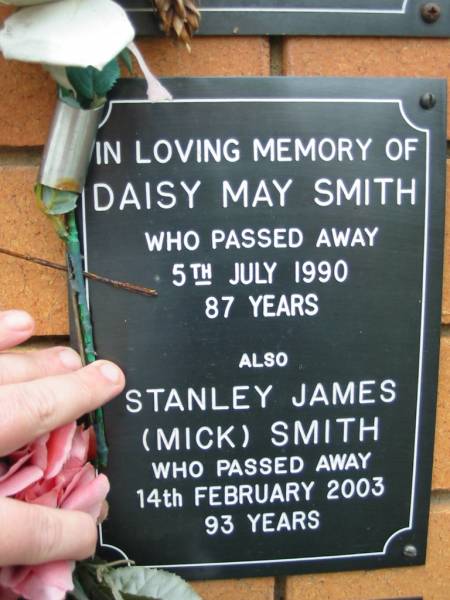 Daisy May SMITH,  | died 5 July 1990 aged 87 years;  | Stanley James (Mick) SMITH,  | died 14 Feb 2003 aged 93 years;  | Rosewood Uniting Church Columbarium wall, Ipswich  | 
