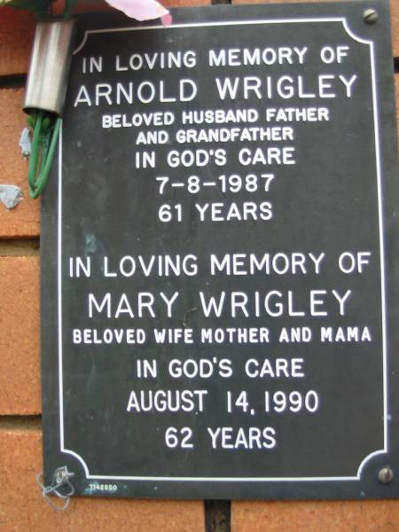 Arnold WRIGLEY,  | husband father grandfather,  | died 7-8-1987 aged 61 years;  | Mary WRIGLEY, wife mother mama,  | died 14 Aug 1990 aged 62 years;  | Rosewood Uniting Church Columbarium wall, Ipswich  | 