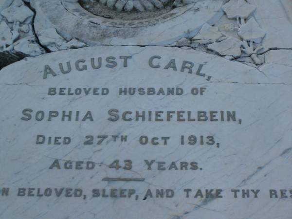 August Carl,  | husband of Sophia SCHIEFELBEIN,  | died 27 Oct 1913 aged 43 years;  | Bald Hills (Sandgate) cemetery, Brisbane  | 