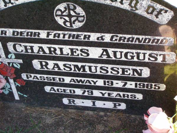 Charles August RASMUSSEN,  | father grandad,  | died 9-7-1985 aged 79 years;  | Tarampa Apostolic cemetery, Esk Shire  | 