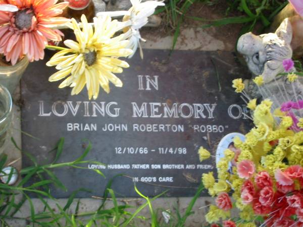 Brian John ROBERTON (Robbo),  | 12/10/66 - 11/4/98,  | husband father son brother;  | Toogoolawah Cemetery, Esk shire  | 