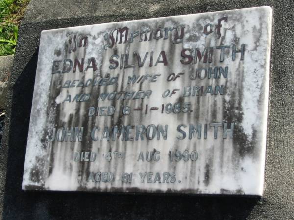 Edna Silvia SMITH,  | wife of John, mother of Brian,  | died 6-1-1985;  | John Cameron SMITH,  | died 4 Aug 1990 aged 81 years;  | Woodford Cemetery, Caboolture  | 