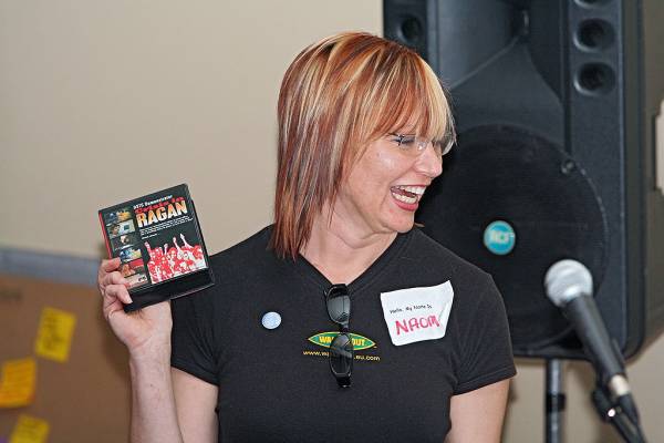 Naomi Andrew, raffling off a limited edition of Crisis in Ragan,  | DSTC Farewell Symposium, 28 July 2005  | 