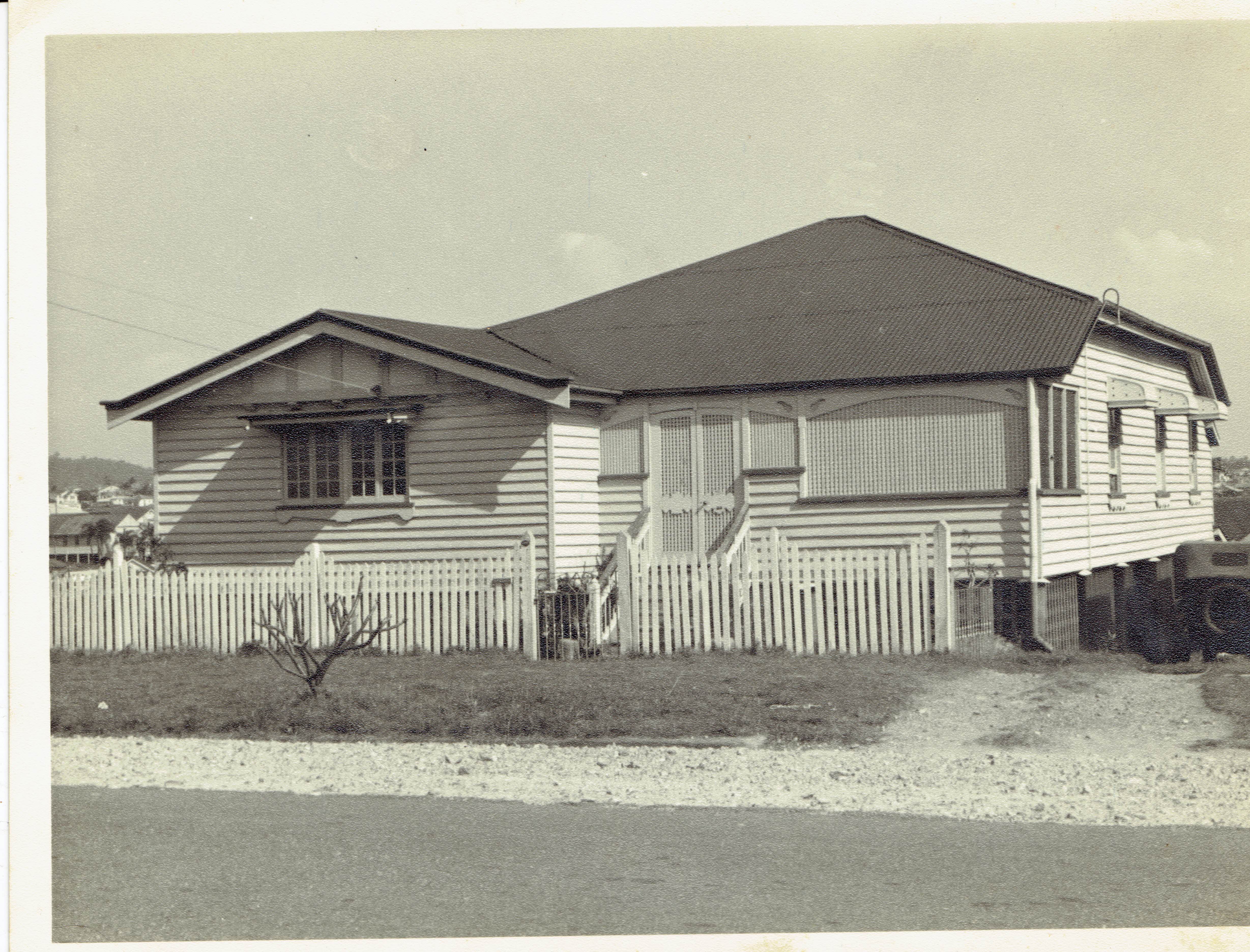 Norman Ave 1950s with 1926 Dodge in driveway.