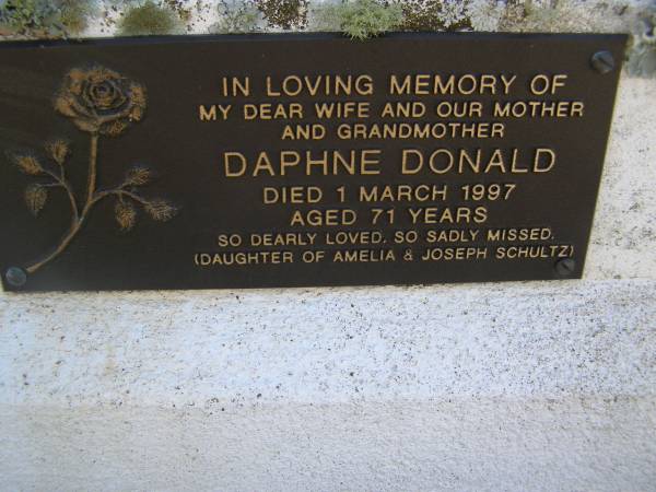 Albert Joseph SCHULTZ,  | died 15 May 1957 aged 77 years;  | Amelia SCHULTZ,  | died 18 Feb 1959 aged 70 years;  | Daphne DONALD,  | wife mother grandmother,  | daughter of Amelia & Joseph SCHULTZ,  | died 1 March 1997 aged 71 years;  | Yarraman cemetery, Toowoomba Regional Council  | 