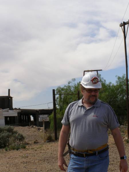 David in a miner's helmet with lamp,  | Historic Day Dream Mine,  | near Silverton, New South Wales  | 