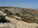 Rocky hillsides lead down to the Great Australian Bight, Nullarbor Plain, Eyre Highway, South Australia 