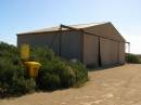 Eucla international (!) airport has an airstrip, a shed and a rubbish bin, Nullarbor Plain, Eyre Highway, Western Australia 