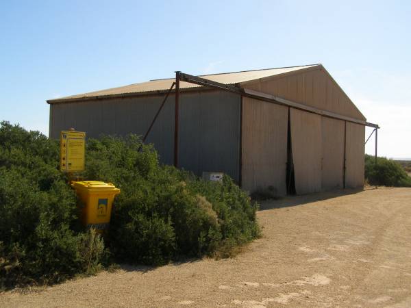 Eucla international (!) airport has  | an airstrip, a shed and a rubbish bin,  | Nullarbor Plain,  | Eyre Highway,  | Western Australia  | 