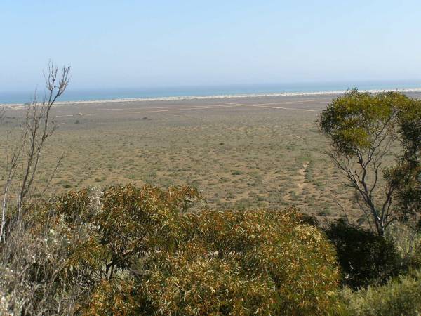 Looking down from Eucla on the escarpment to the  | Southern Ocean,  | Nullarbor Plain,  | Eyre Highway,  | Western Australia  | 