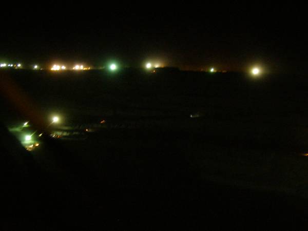 The Super Pit at night,  | the lights are from the trucks etc,  | it is 24x7 operation,  | Kalgoorie, Western Australia  | 
